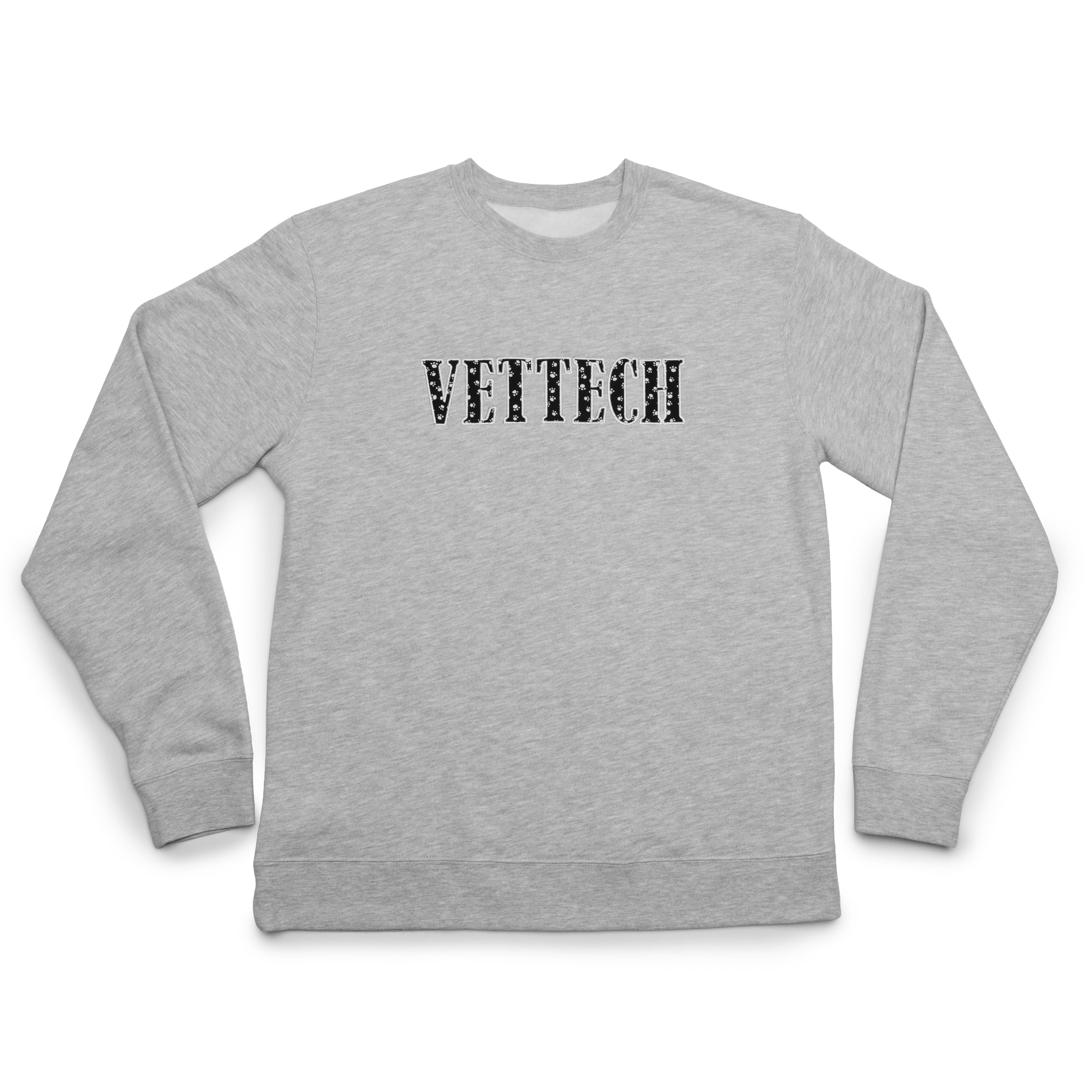 Grey Heather crewneck laid flat with the Vet Tech design appliqued on the chest
