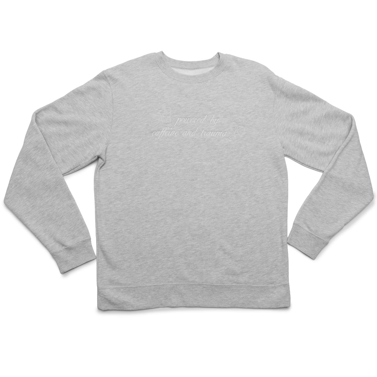 Grey Heather crewneck laid flat with the Powered by Caffeine and Trauma design embroidered on the chest